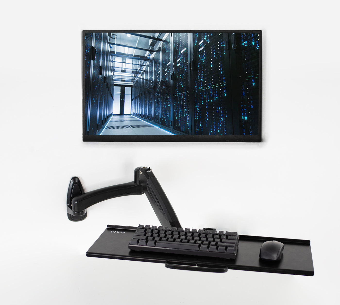 Wall mount keyboard tray supporting a mouse and keyboard below a wall-mounted monitor.